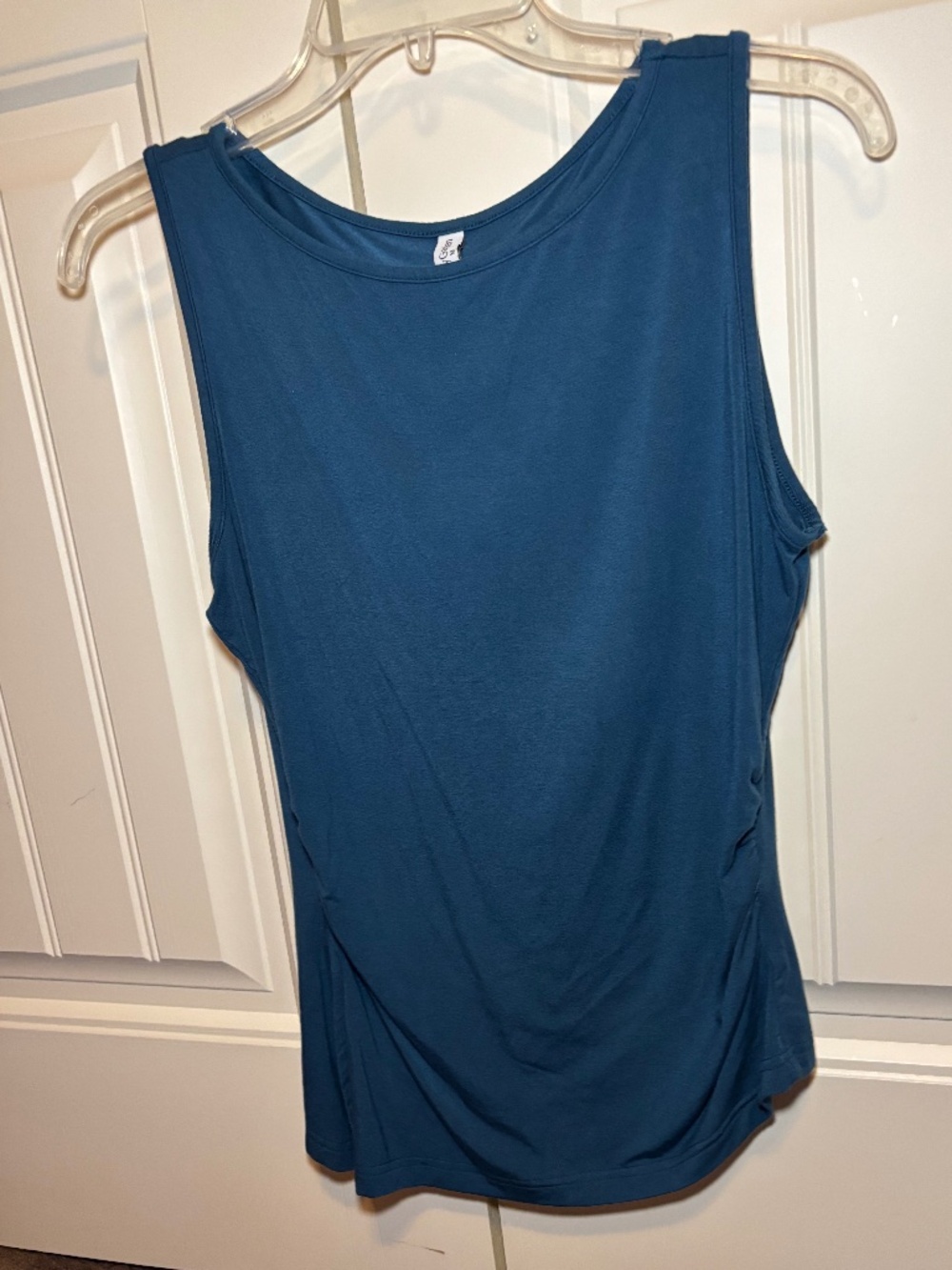 Sleeveless teal top